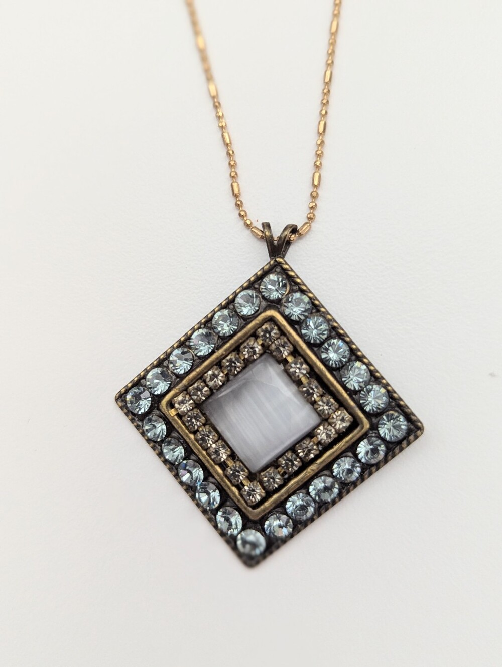 Gold-Tone Square Pendant Necklace w/Blue & Gold Stones Surrounding Centre Stone